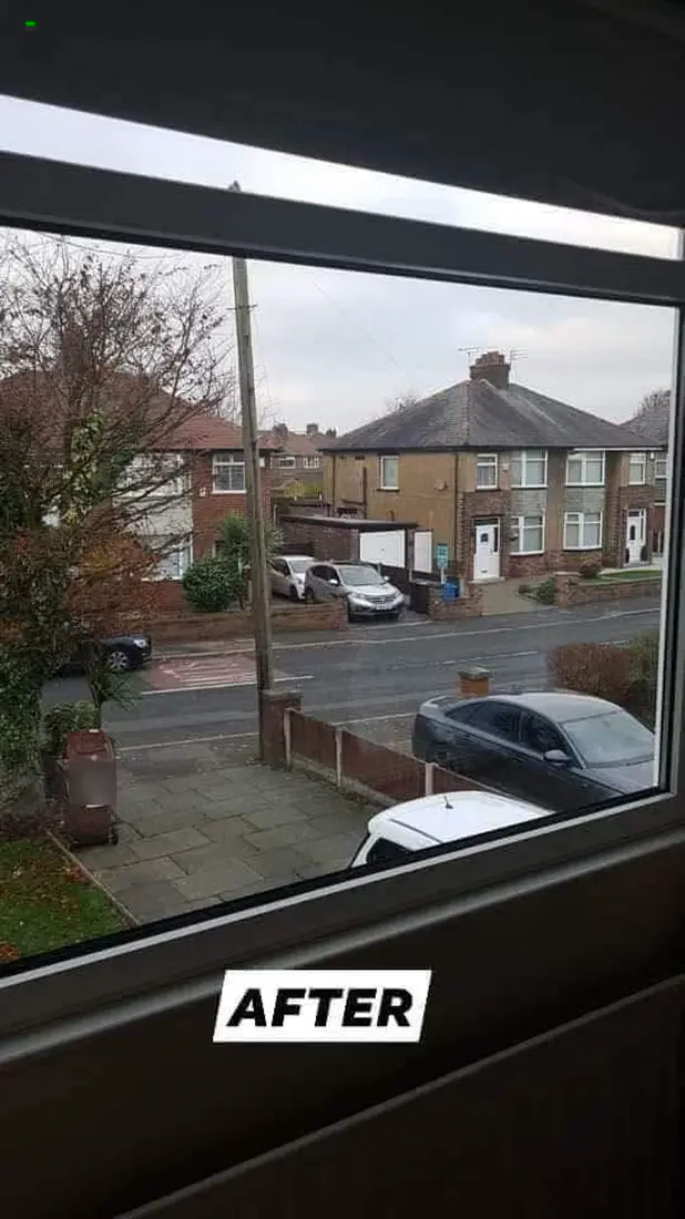 After: The same window with clear new glass